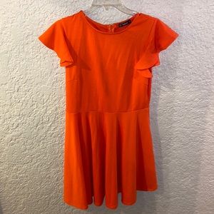 Dress, shorter on the bottom. Bright orange